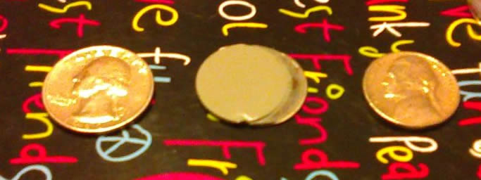 Nickel-Stuck-On-Quarter?